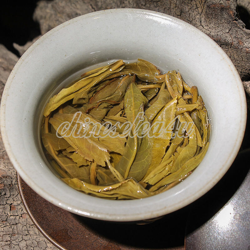 Organic Pu Erh Tea Cake - Fragrant Orchid & Shantou Spring Blend - Image 3